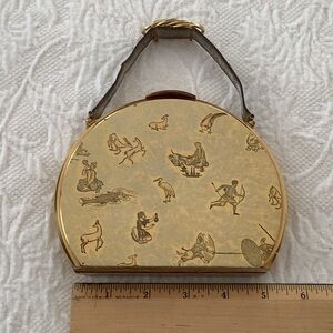 Vintage circa 1950 Gold and Brown Clutch with Dome Shape and Pattern